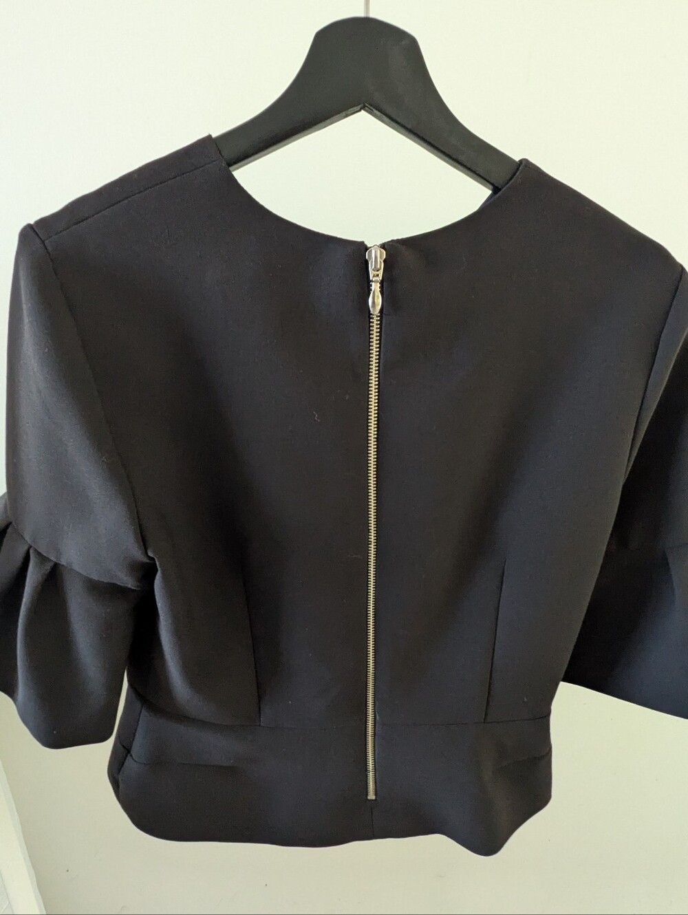Structured Black Peplum Top with Ruffled Sleeves - Picture 2 of 5